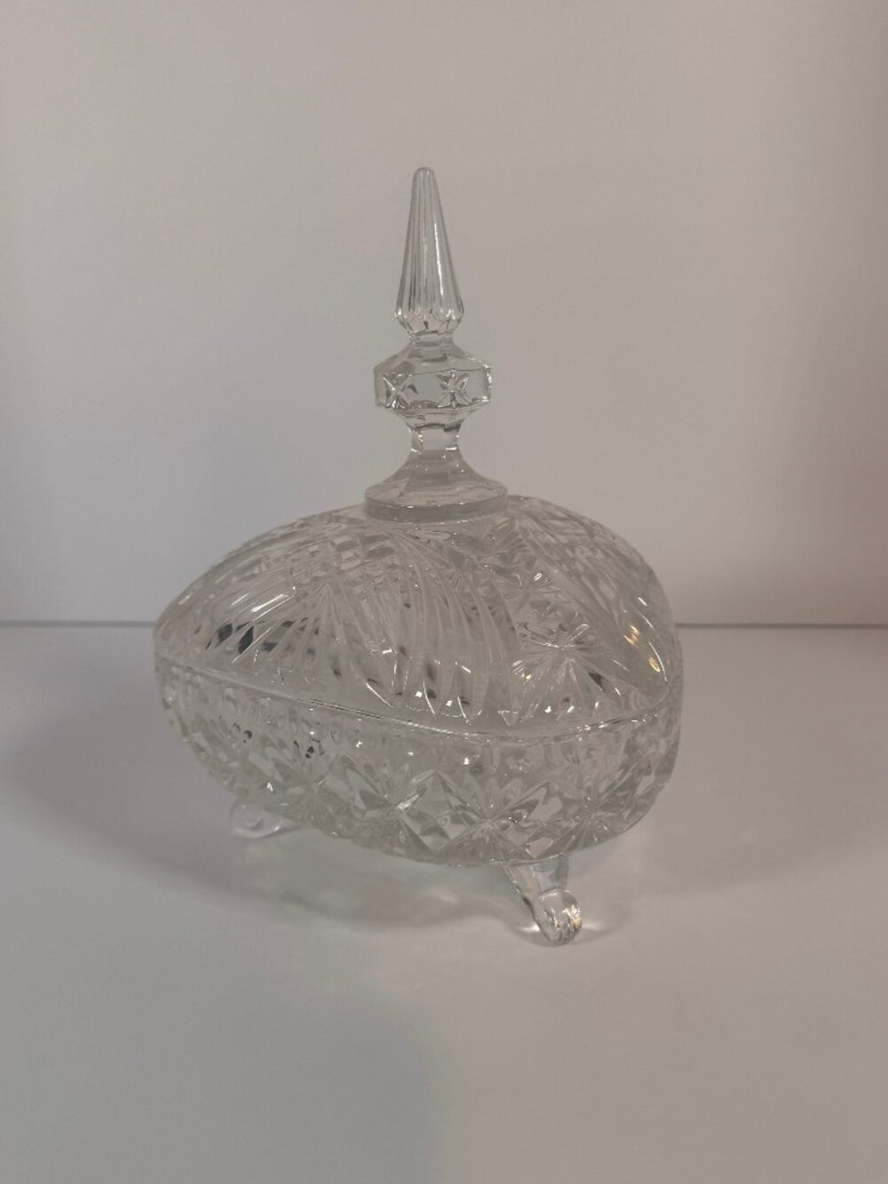 Vintage lead crystal footed candy dish with a steeple lid
